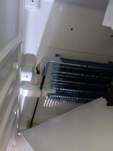 freezer evaporator coil ice buildup defrost issue