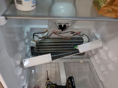 refrigerator evaporator coil defrost repair