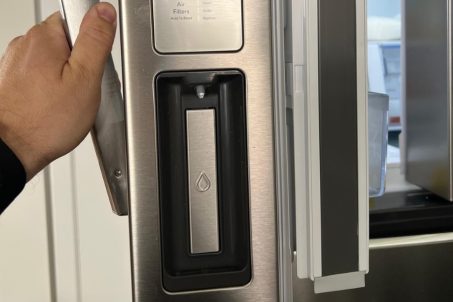 water dispensing system in a fridge repair